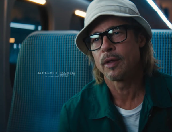 Brad Pitt en la película Bullet Train con gafas de POlice